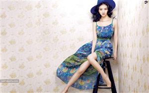 Police Story famed Chinese actress, Jing Tian in a floral dress